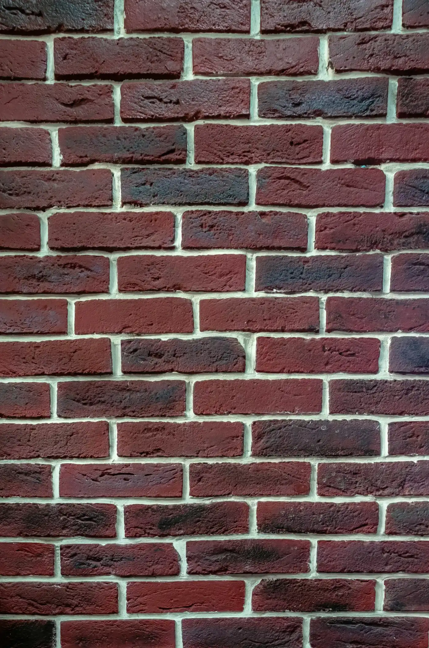 Omfugning af murstensfacade